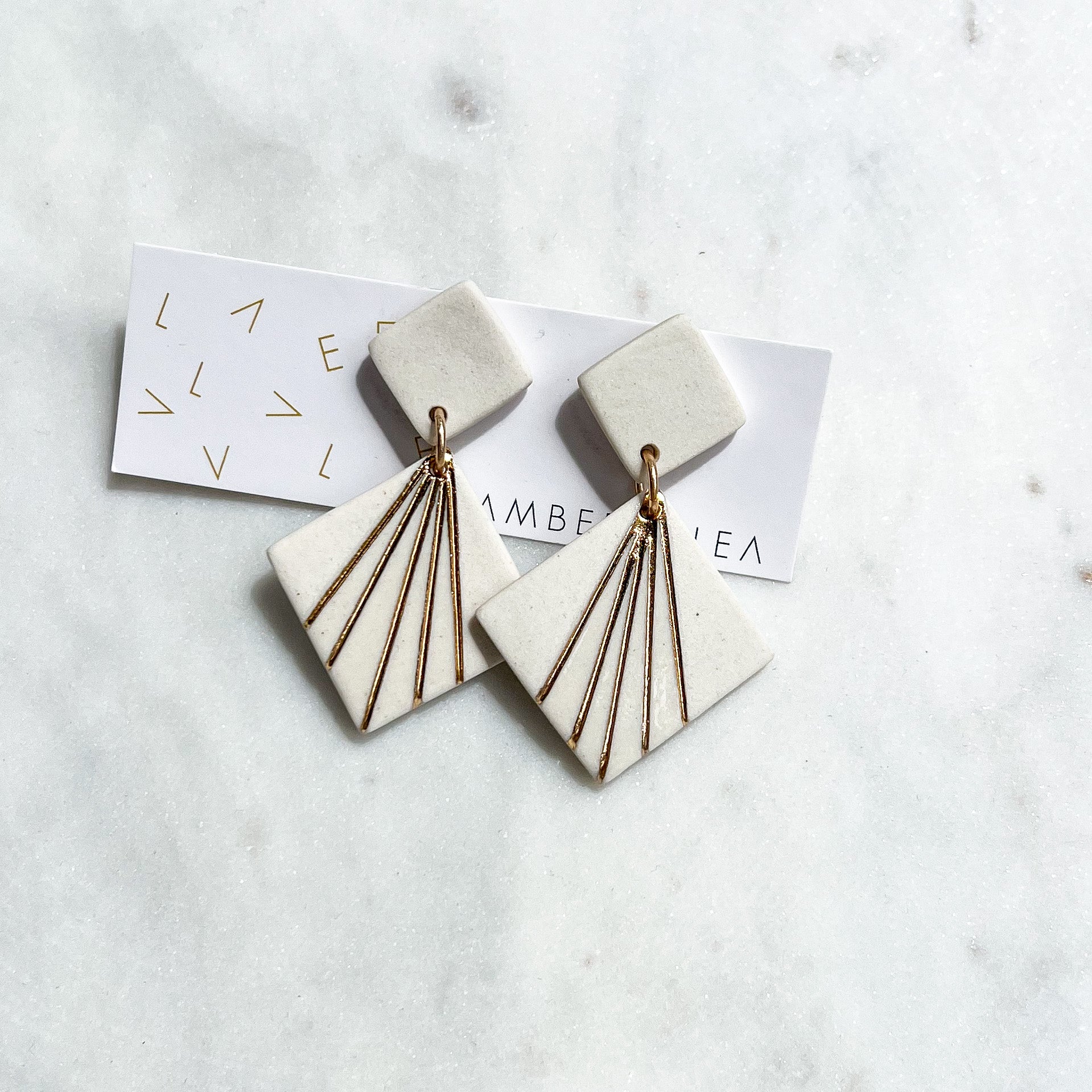 Astro White Stud Earrings with Gold Inlay by AMBER E LEA