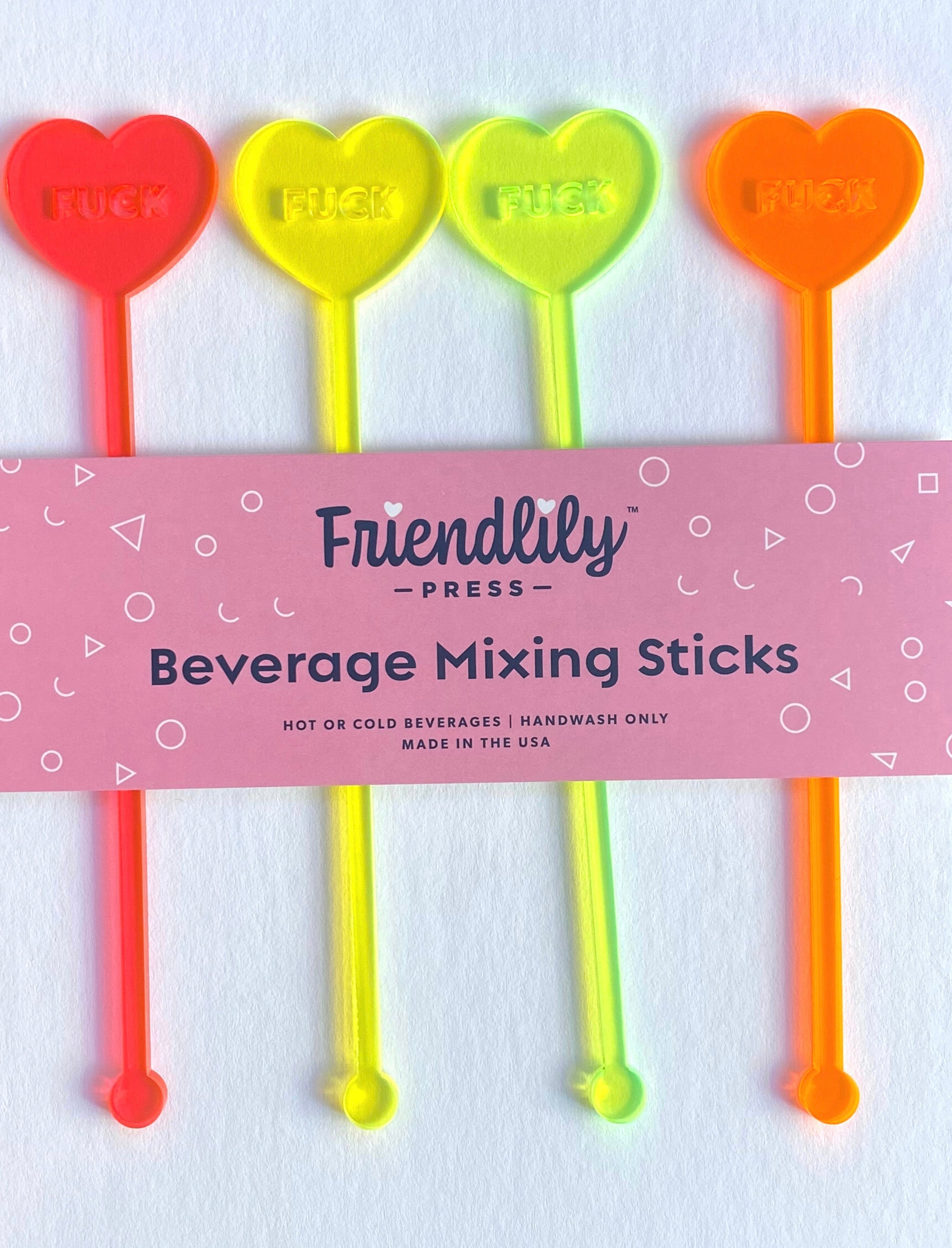 FUCK Hearts Drink Stirrer Set by Friendlily. Neon drink stirrers. Drink stirrers for neon party. Neon party decor. Cocktail mixing sticks that are heart shaped. FUCK drink stirrers.